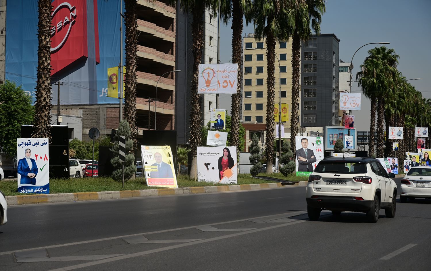 پۆستەری بانگەشەی هەڵبژاردنی لایەنەکان لە هەولێر. وێنە: بڵند تاهیر - رووداو