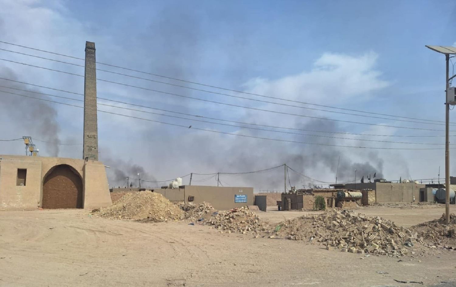 إغلاق 144 معملاً غير نظامي ينفث الأدخنة في سماء بغداد