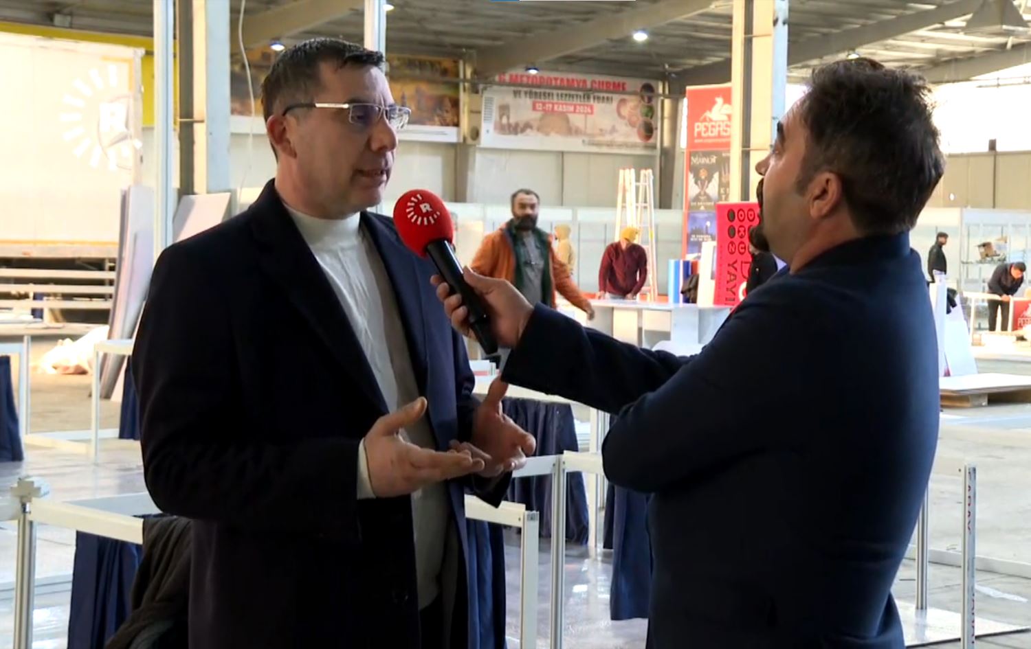 Nûnerê Odeya Bazirganiyê ya Amedê Welat Ektîrîcî/Wêne: Rûdaw Grafîk