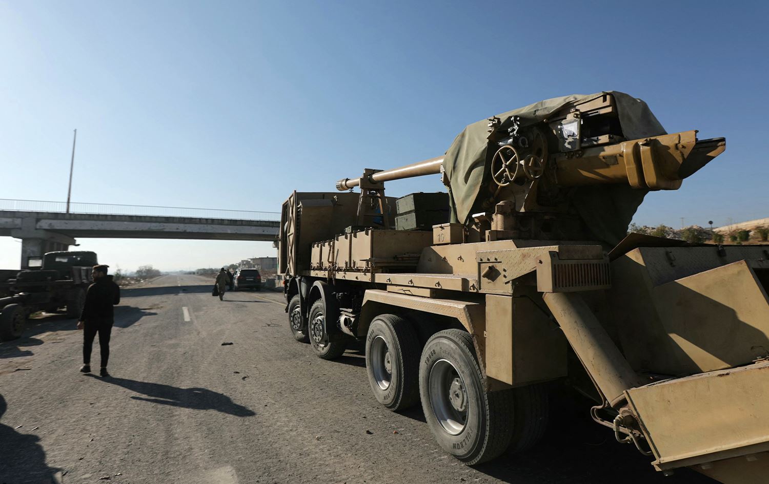 Syrian regime battles advancing rebels near Hama city