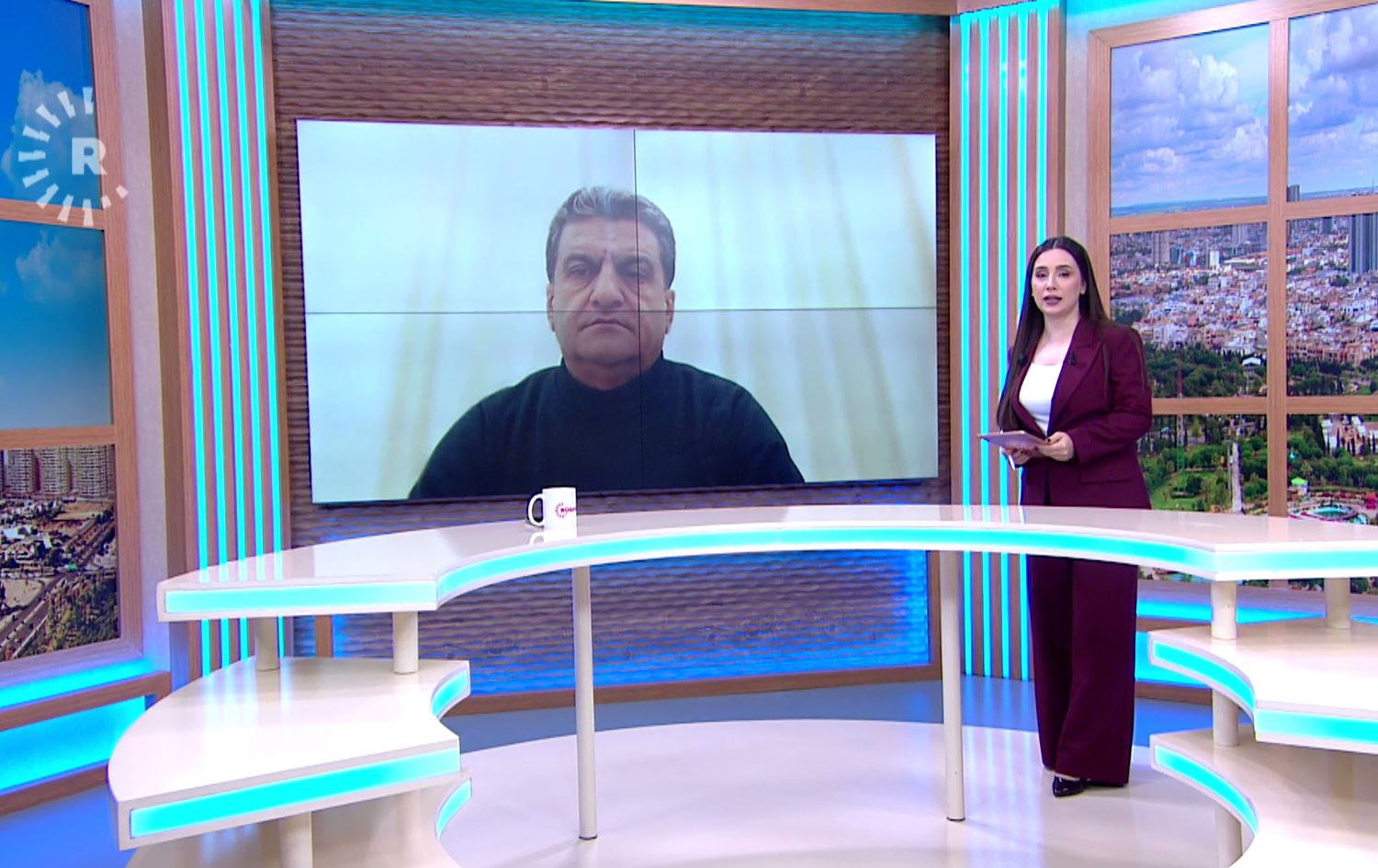 Serokê Encûmena Xwecihî ya ENKSyê ya Efrînê Ehmed Hesen nû mêvanê Nalîn Hesenê /Wêne: Rûdaw