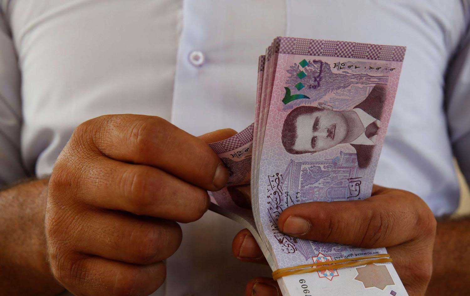 مەترسییەکانی مامەڵەکردن بە لیرەی سووری؛ 'لە چەند رۆژێک بەهاکەی 800٪ بەرزبووەوە'