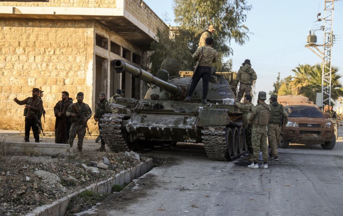 Bir grup Suriye rejim karşıtı militan / Foto: AFP
