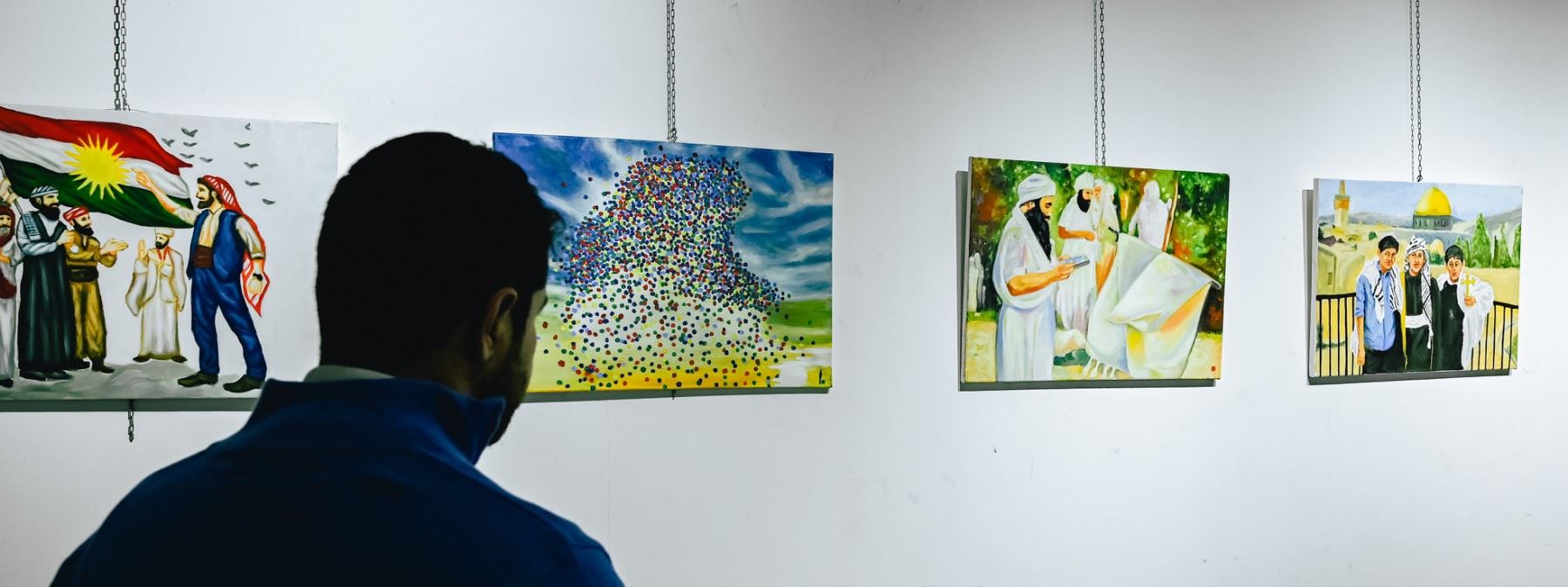 وێنە؛ پێشانگەی 'پێکەوەژیان هەوێنی تەباییە' لە هەولێر