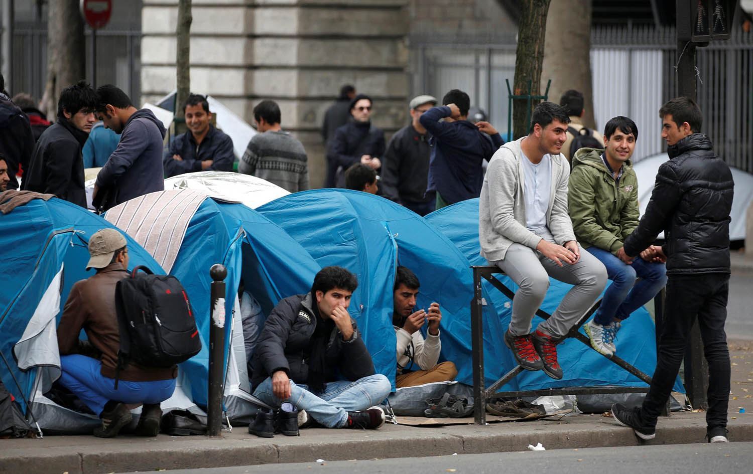 Hinek koçberên li Fransayê: Wêne: Reuters