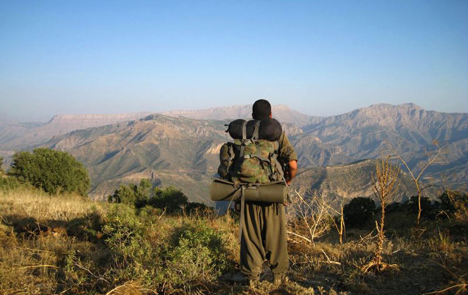 گەریلایەکی پەکەکە لە چیاکانی کوردستان. وێنە: AFP 