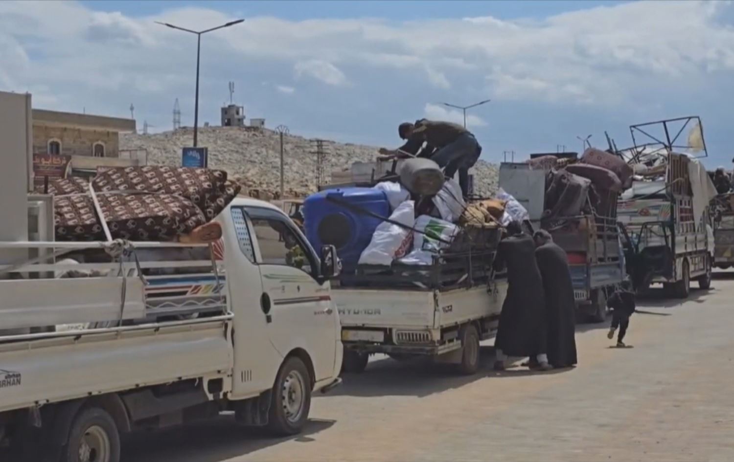 Koçberên ku bar dikin /Wêne: Ajans