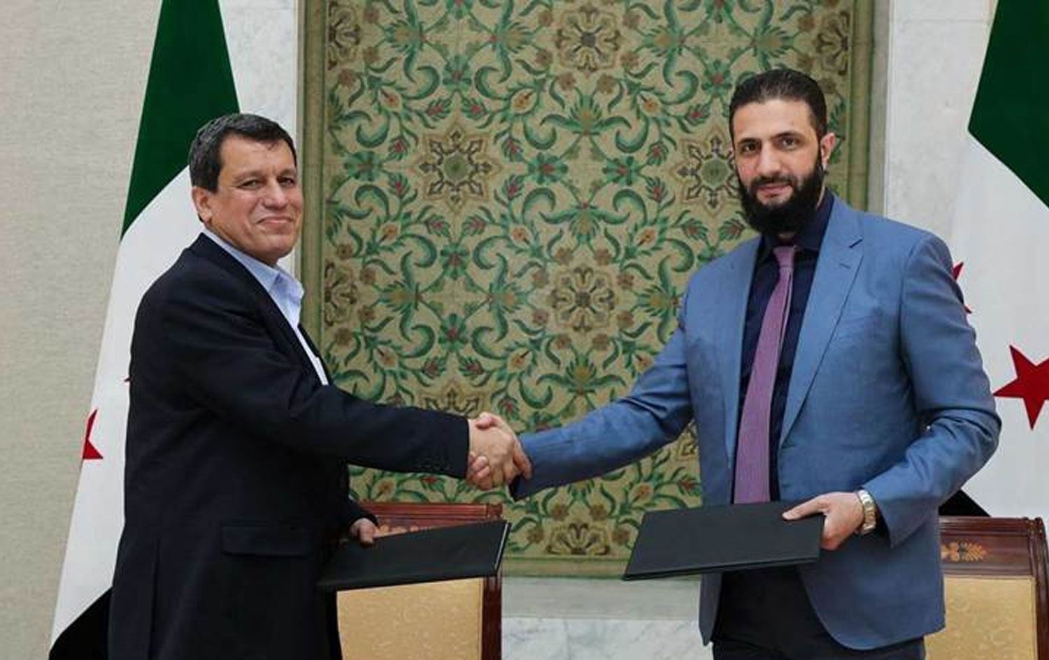  Dema ku Mezlûm Ebdî û Ehmed Şer peyman îmze kir / Wêne: Arşîv