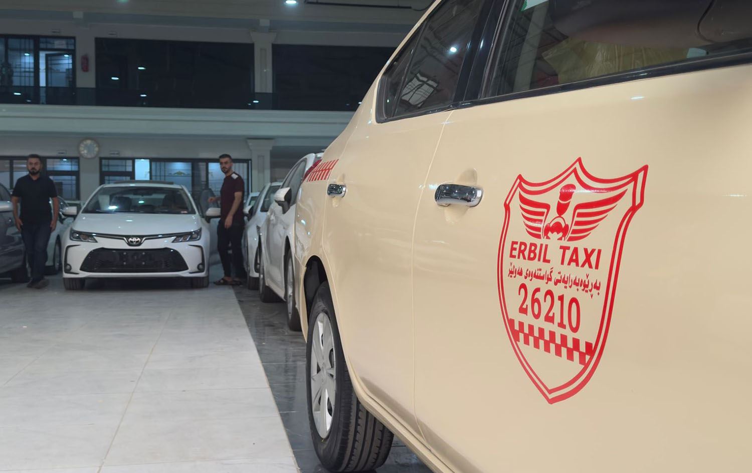 A taxi at a car dealership in Erbil on May 5, 2025. Photo: Sehend Mayiwar/Rudaw