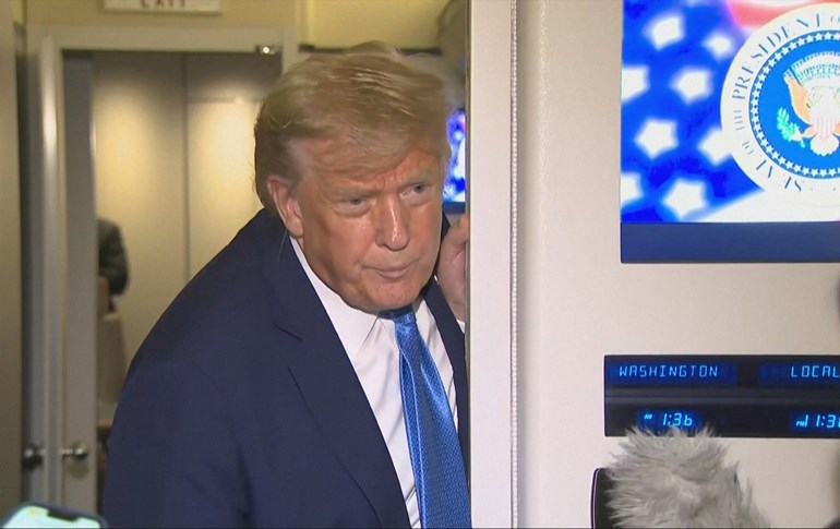 US President Donald Trump speaking to reporters on board Air Force One on June 17, 2025. Photo: AFP