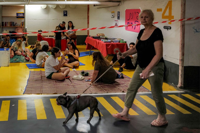 مانەوە لە پەناگەکانی ئیسرائیل لە ترسی هێرشی ئێران. وێنە: AFP