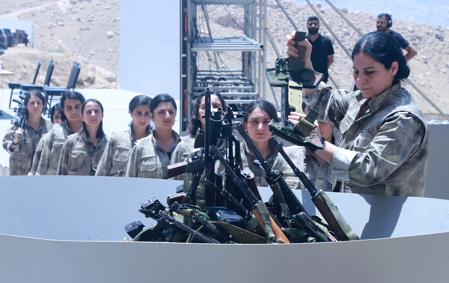 Kurdish fighters burn weapons, signal end to armed struggle against Turkey