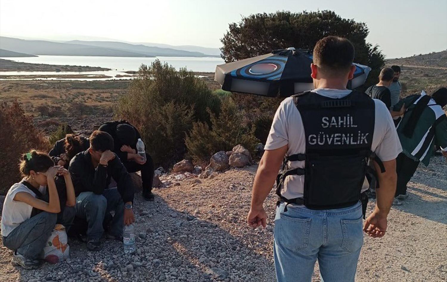 Koçberên hatine desteserkirin / Wêne: AA