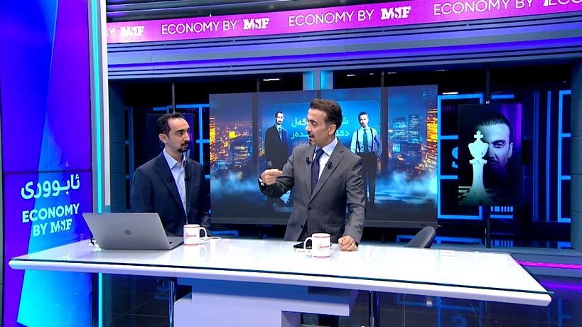 د. محەممەد ئەمین کە بە د. ترەیدەر ناسراوە لەگەڵ محەممەد شێخ فاتیح، پێشکەشکاری رووداو.