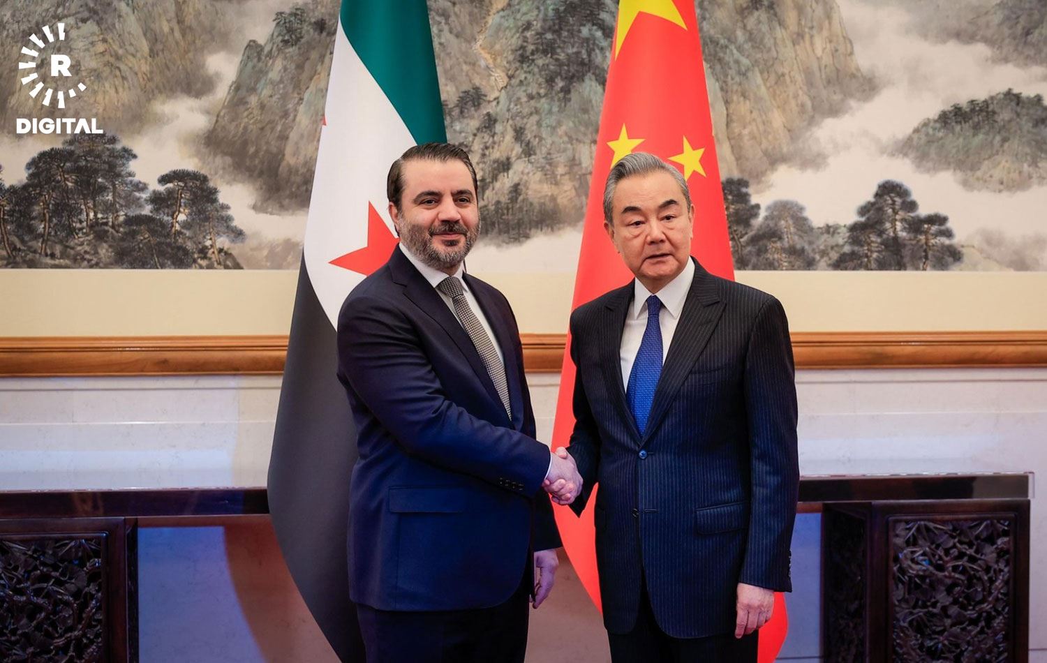 Şeybani (solda), Çinli mevkidaşı Vang Yi ile başkent Pekin'de görüştü. 