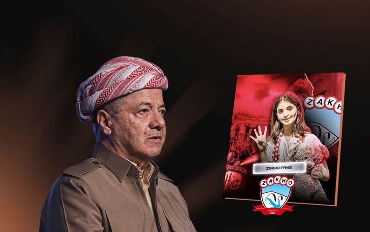 Serok Mesûd Barzanî û Logoya Tîma Zaxoyê\ Wêne: Rûdaw