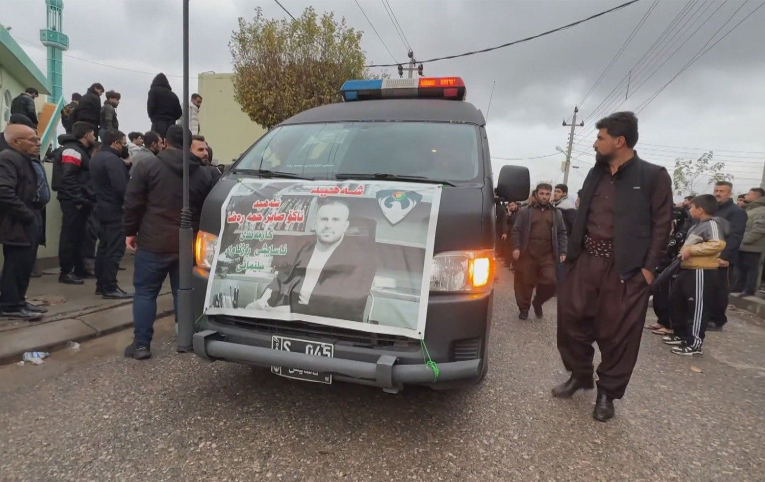 ساتی گەڕاندنەوەی تەرمی ئاکۆ بۆ چەمچەماڵ. وێنە: رووداو