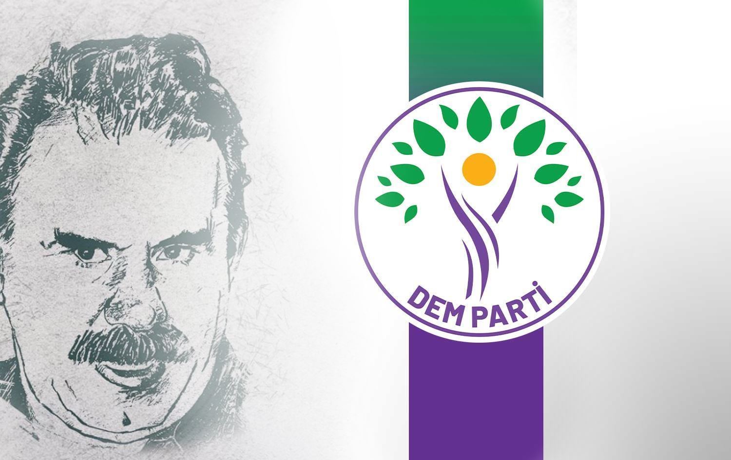 لۆگۆیەکی دەم پارتی و وێنەیەکی ئەرشیڤی عەبدوڵڵا ئۆجەلان