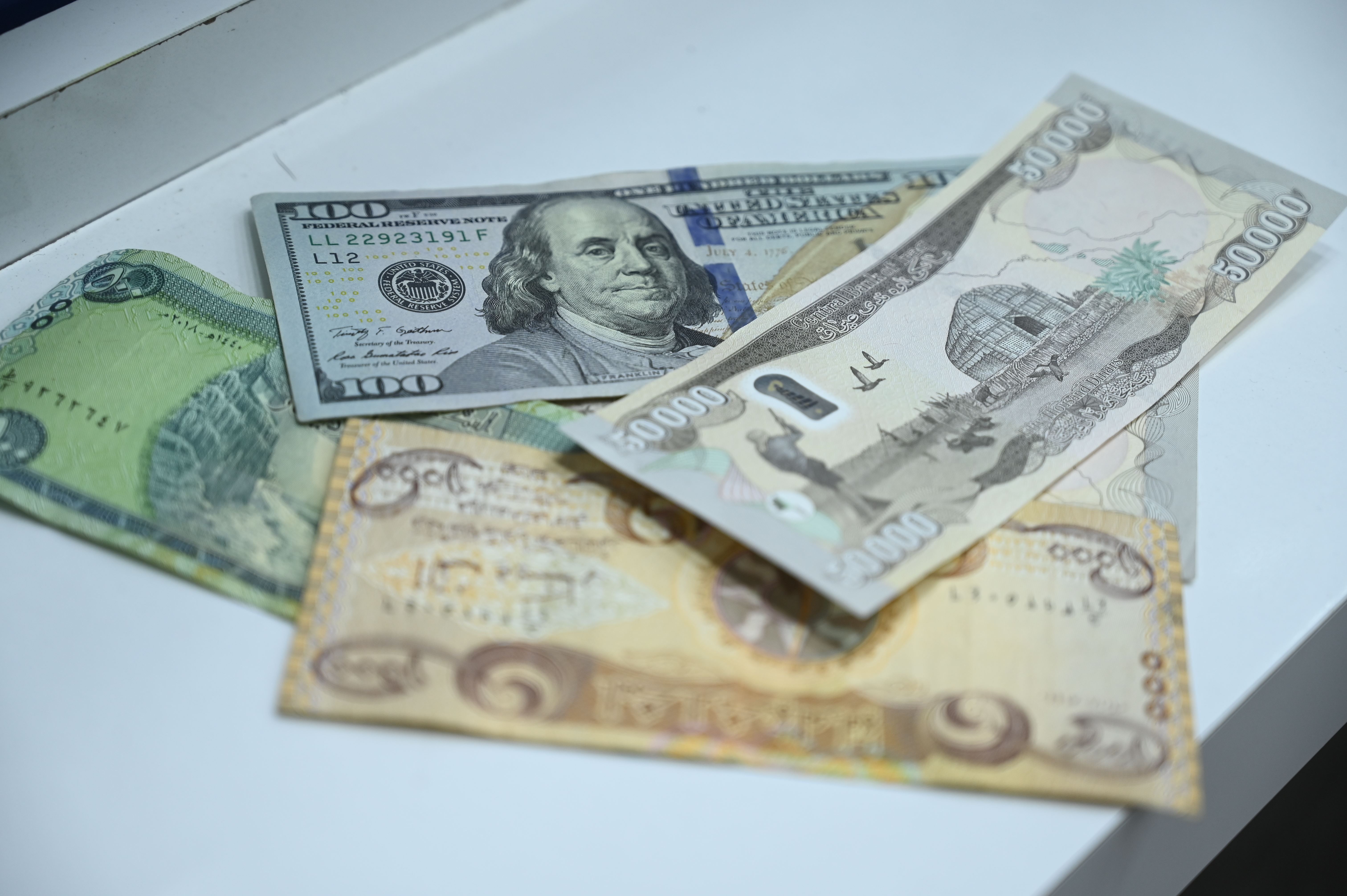 دینار و دۆلار. وێنە: بڵند تاهیر - رووداو