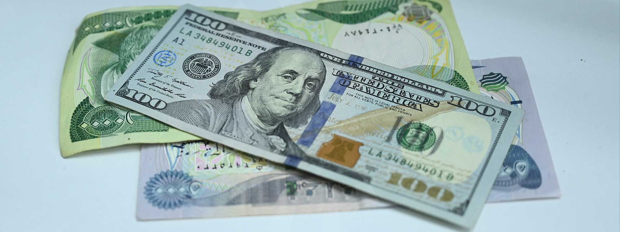 US dollar and Iraqi dinar banknotes. Photo: Bilind T. Abdullah/Rudaw