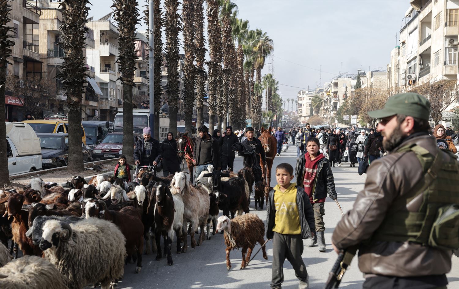 دەرچوونی دانیشتووانی گەڕەکە کوردنشینەکانی حەلەب. وێنە: AFP