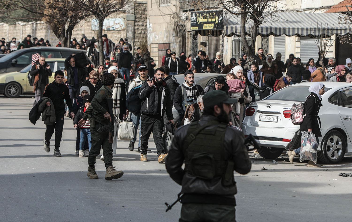 جێهێشتنی گەڕەکە کوردنشینەکانی حەلەب بەهۆی ئاڵۆزی و شەڕەوە. وێنە: Bakr ALkasem / AFP