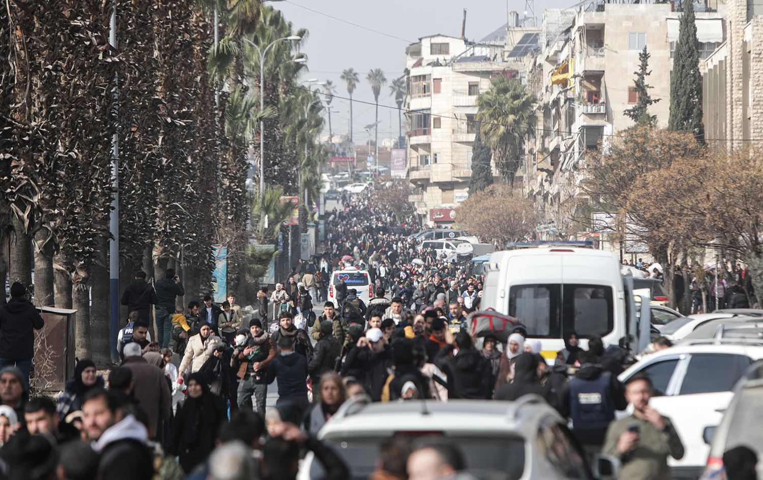 نزوح الكورد من حيي الأشرفية والشيخ مقصود في حلب - AFP