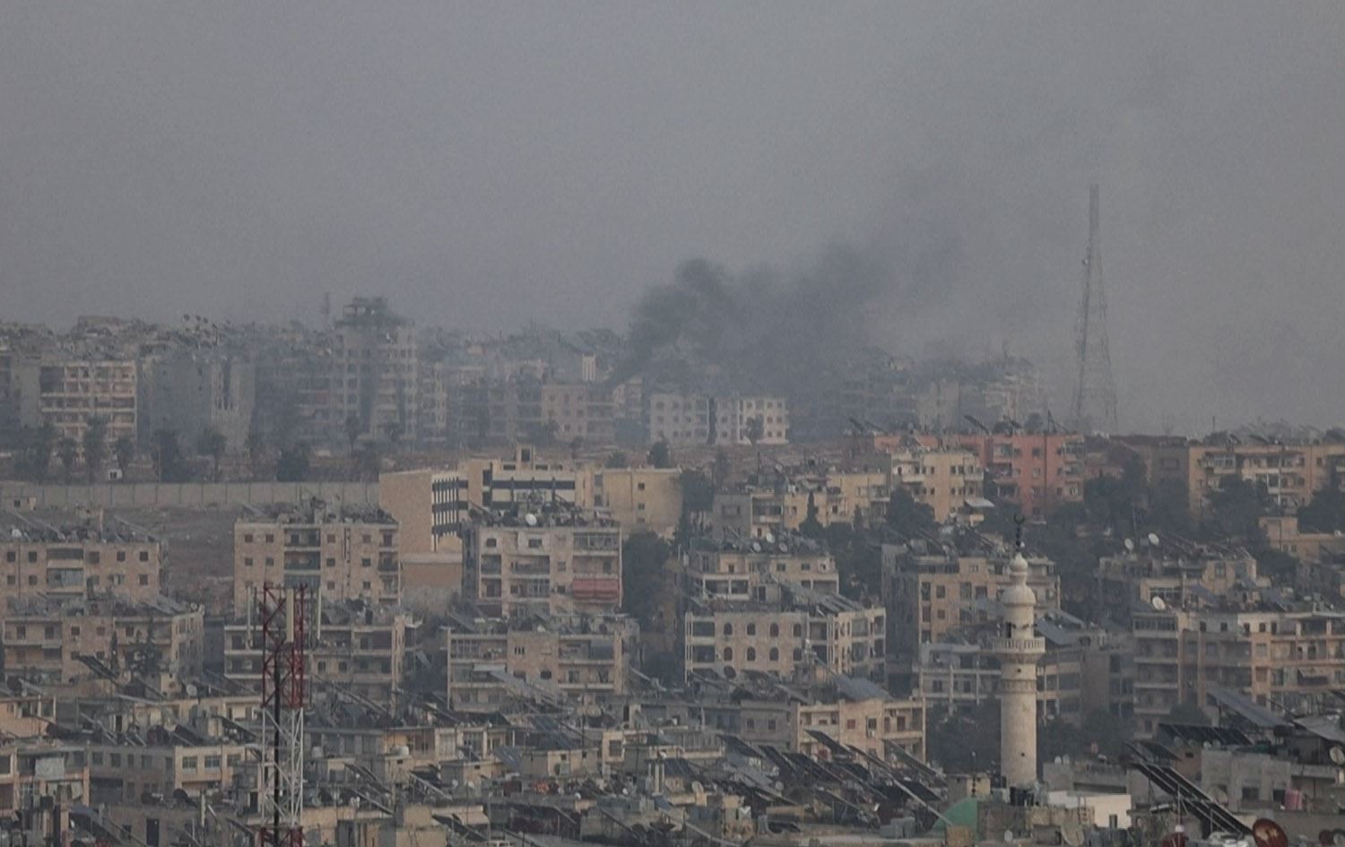 بەرزبوونەوەی دووکەڵ لە ناوچەیەکی حەلەب لە رۆژانی رابردوو لە شەڕ و گرژییەکاندا. وێنە: AFP