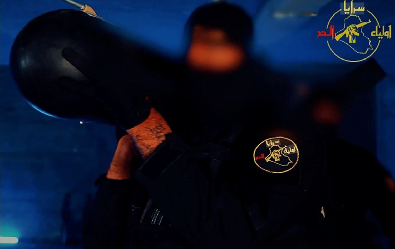 أحد مقاتلي فصيل سرايا الدم المسلح