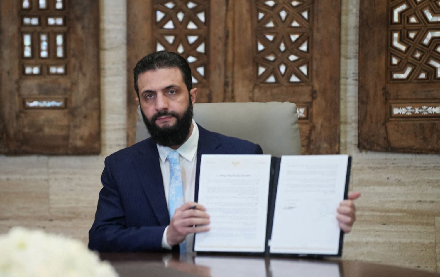 أحمد الشرع بعد توقيع بنود الاتفاقية مع مظلوم عبدي-AFP