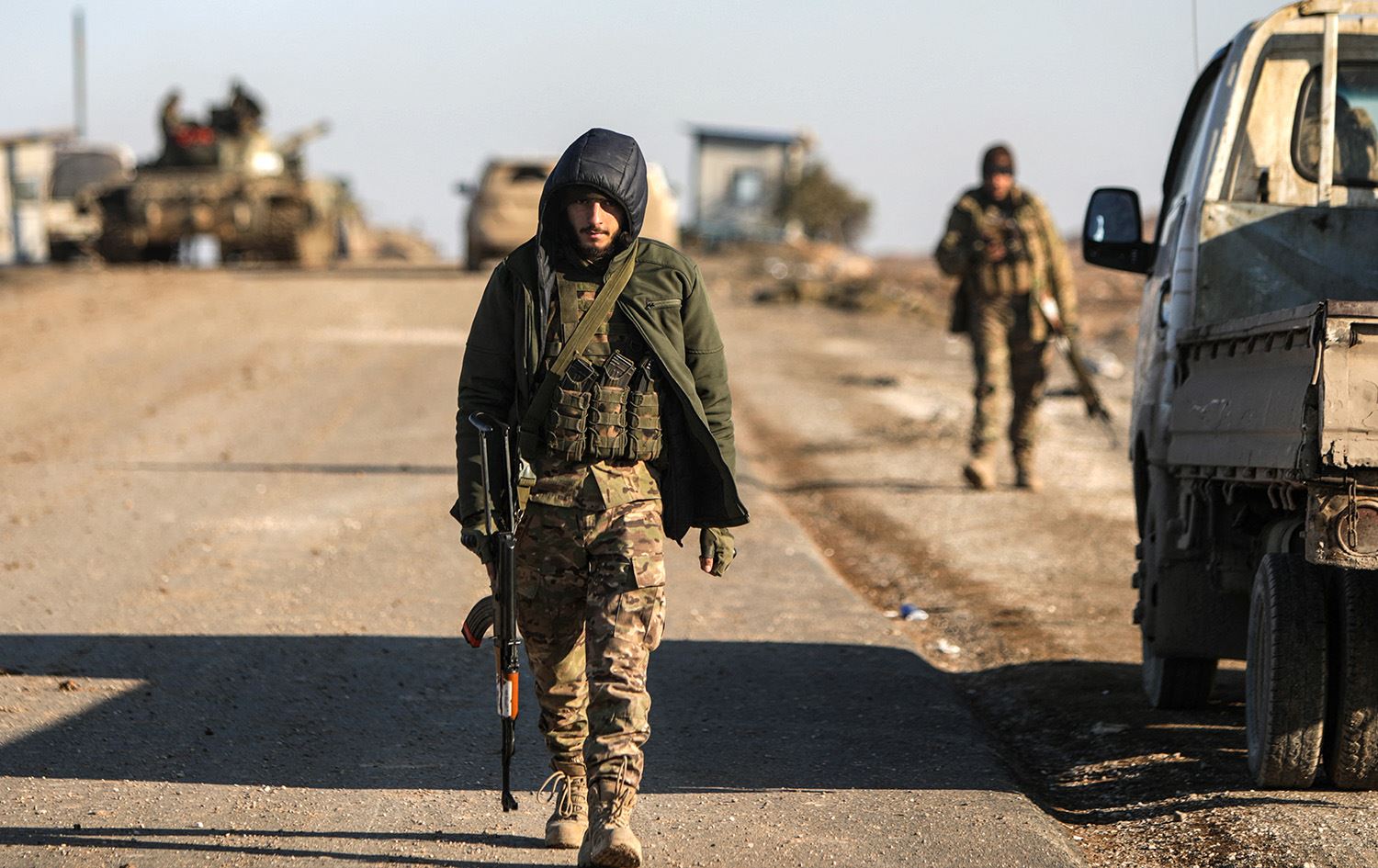 عنصران من الجيش العربي السوري-AFP