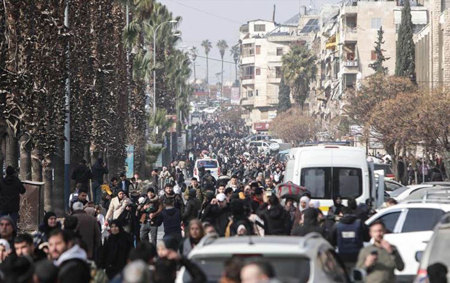 نزوح الكورد من حيي الأشرفية والشيخ مقصود بحلب خلال الأسابيع الماضية - AFP