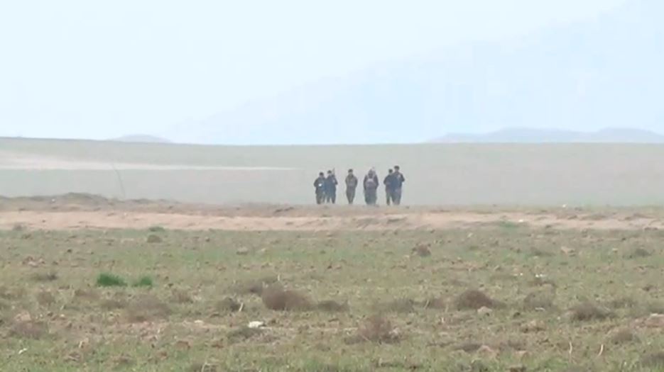 ژمارەیەک پێشمەرگە لە ناوچەکە.