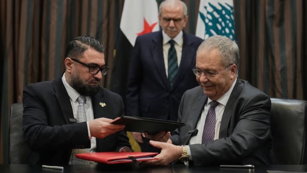  نائب رئيس الحكومة اللبناني طارق متروي وزير العدل السوري مظهر الويس