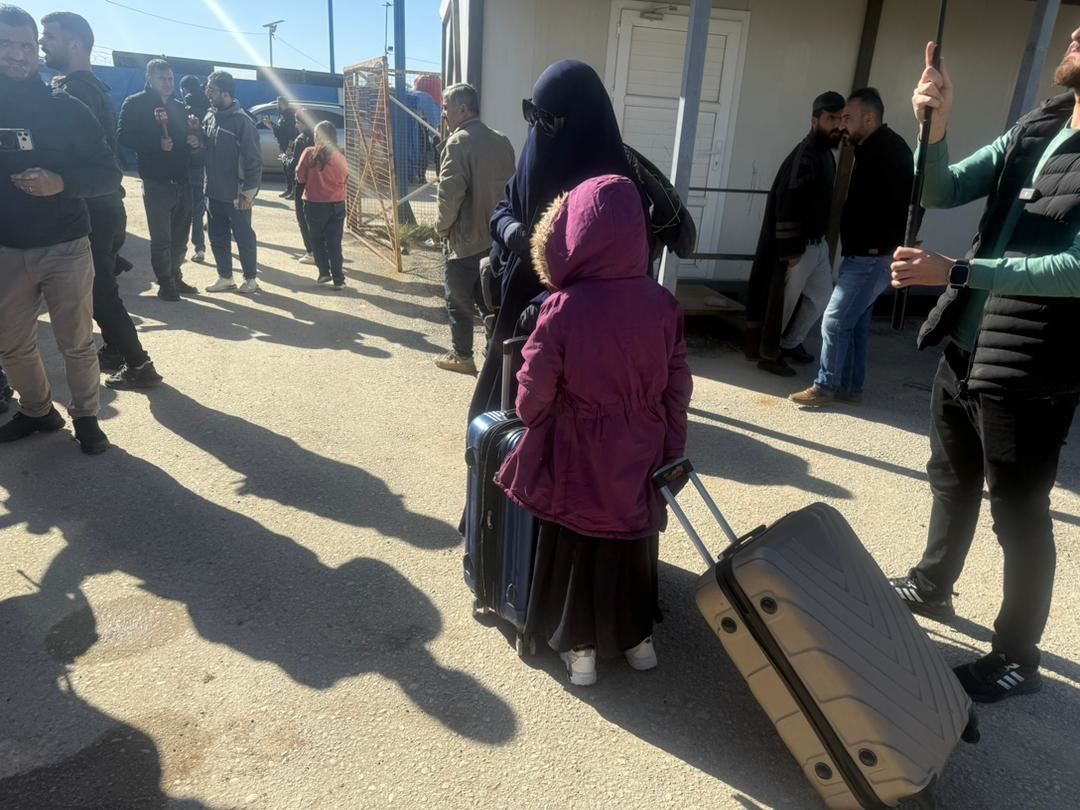 صورة عوائل داعش خلال خروجهم من المخيم قبل إعادتهم
