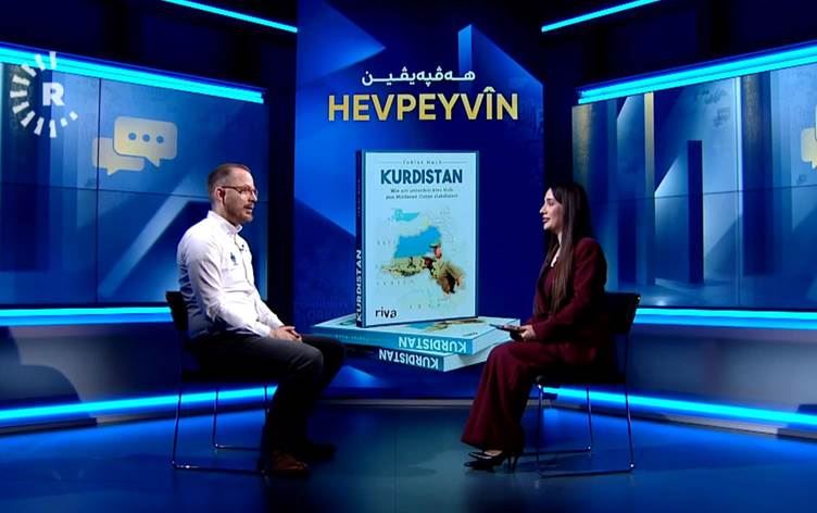 نالين حسن والكاتب الألماني توبياس هوخ