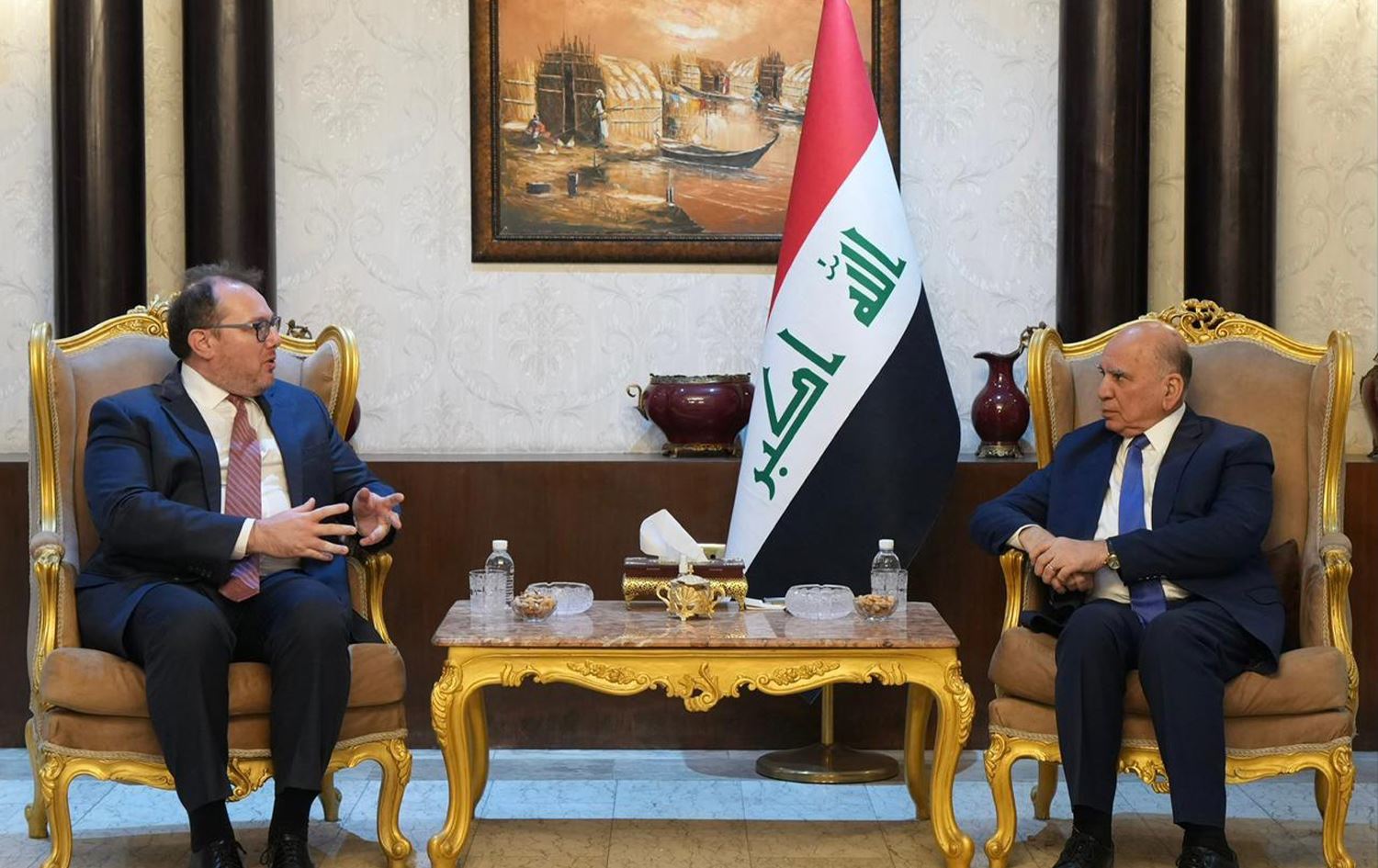 وزير الخارجية العراقي والقائم بالأعمال الأميركي