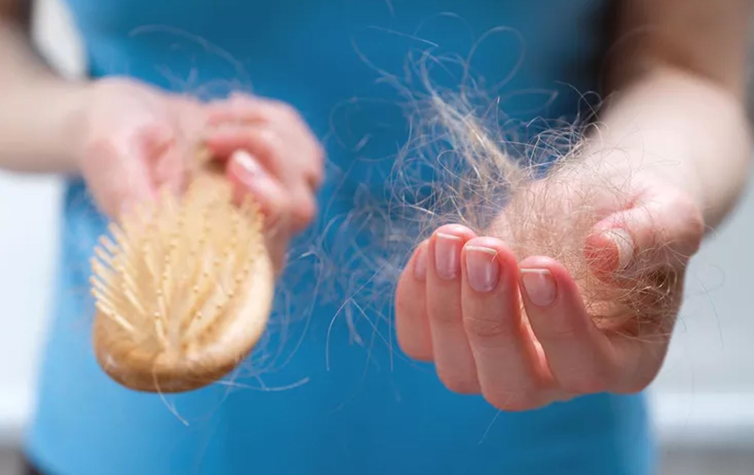 هەڵوەرینی قژ. وێنە: Getty Images