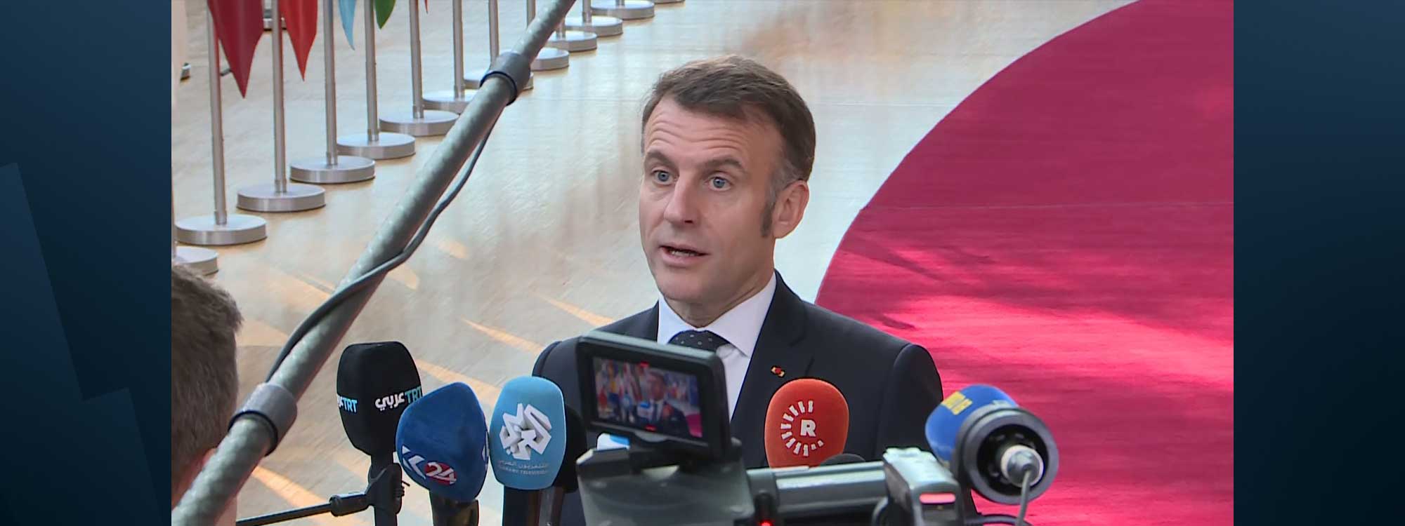France's President Emmanuel Macron speaks to journalists as he arrives for a EU Summit at the EU headquarters in Brussels, on March 19, 2026. Photo: Screengrab/ Rudaw