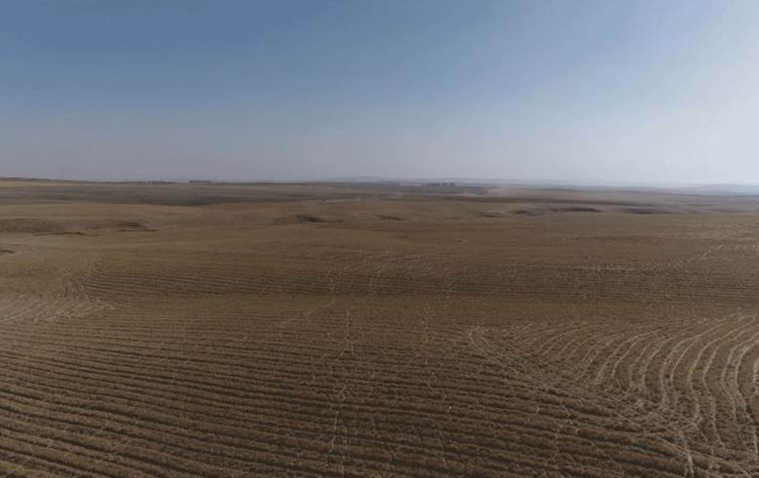 ژمارەیەک زەوی لە سنووری پارێزگای دهۆک. وێنەکە بۆ روونکردەنەوەی هەواڵەکەیە