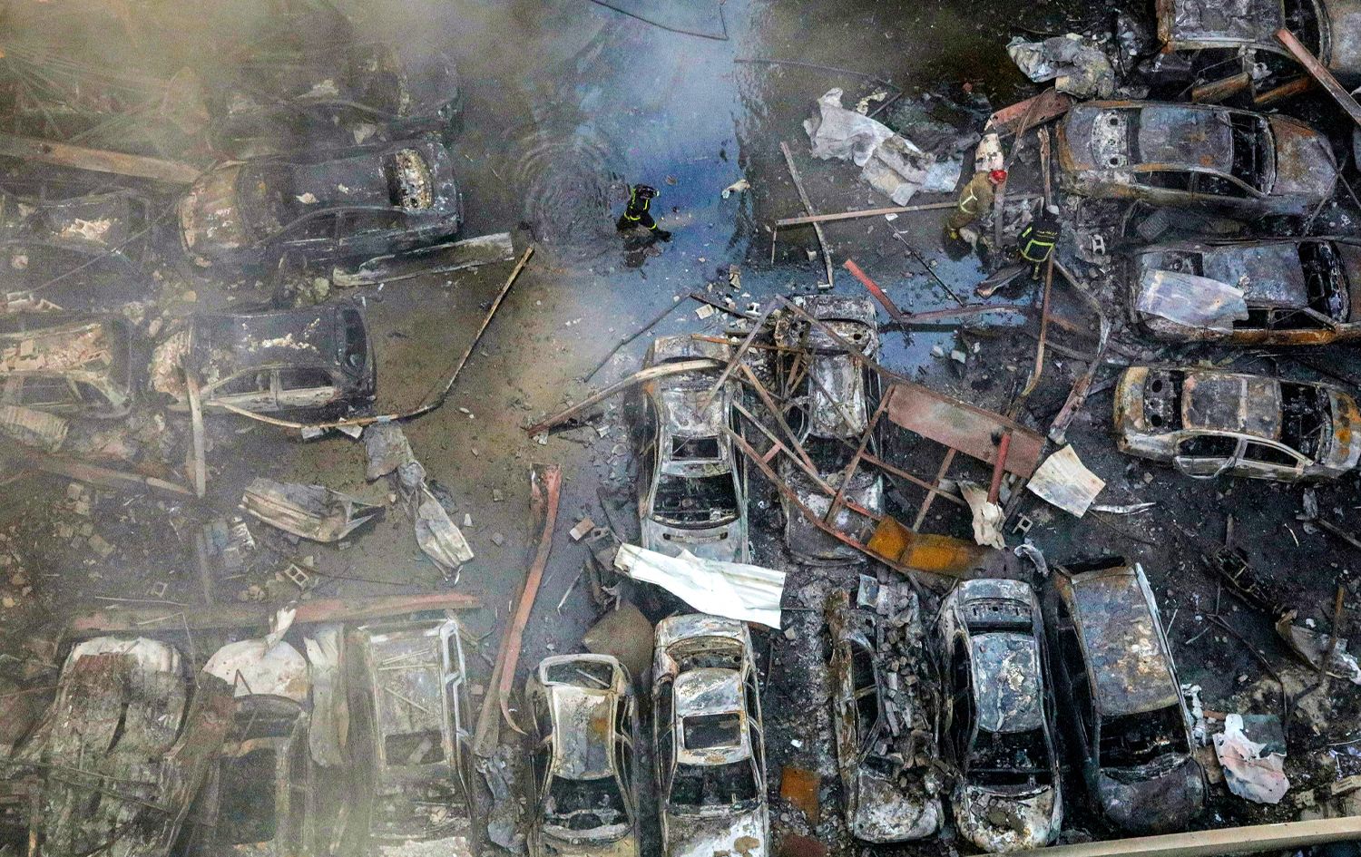 هێرشی ئیسرائیل بۆ سەر لوبنان دەیان ئۆتۆمبێلی سووتاندووە. وێنە: AFP