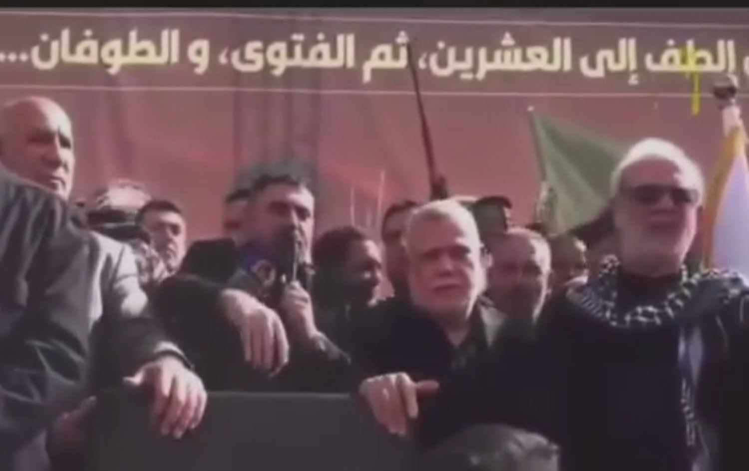 هادی عامری لە کاتی کۆبوونەوە جەماوەریەکەدا