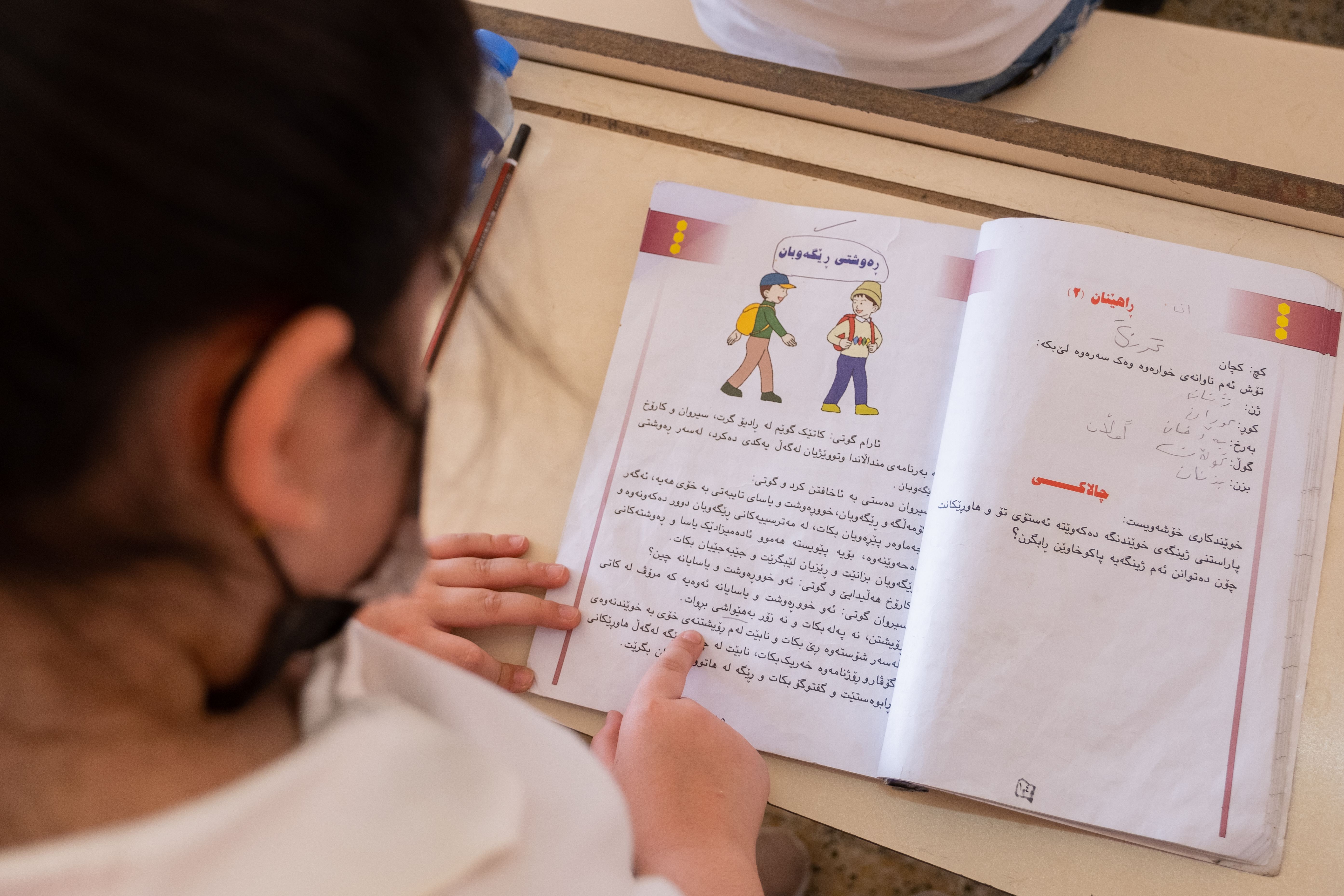 قوتابییەک وانەکانی دەخوێنێت. وێنە: بڵند تاهیر - رووداو