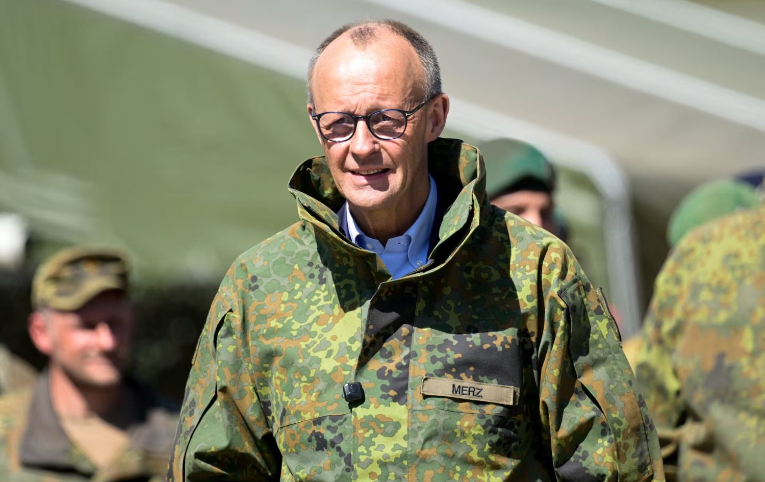 فرێدریش مێرتس، راوێژکاری ئەڵمانیا لە بنکەیەکی سەربازیی وڵاتەکەی. وێنە: Reuters