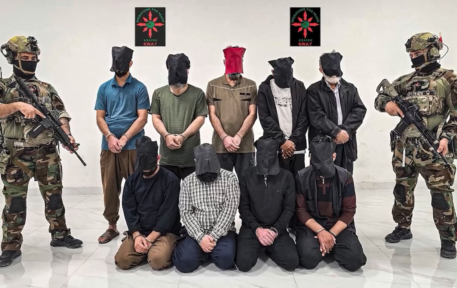 وێنەی دەستگیرکراوان. 