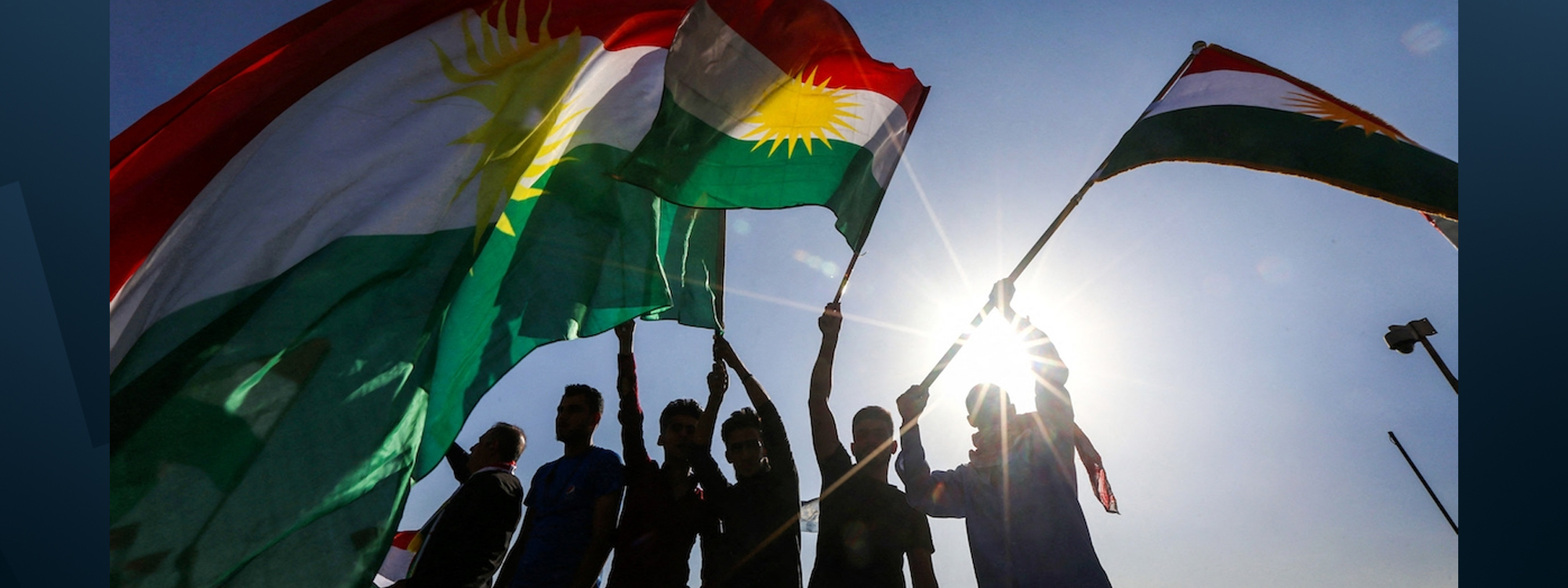Kurdistan flags being waved during a demonstration outside the UN Office in Erbil on October 21, 2017. Photo: Safin Hamed / AFP 