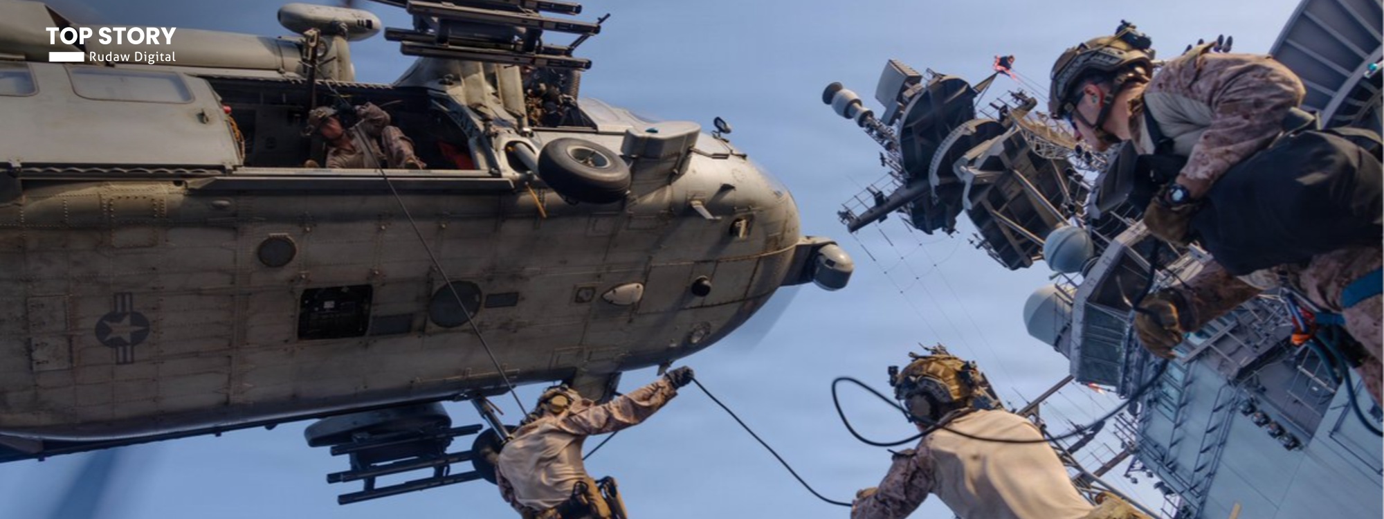 US marines rappel out of an MH-60S Sea Hawk during scheduled training aboard USS Tripoli, supporting the US blockade against Iran. Photo: CENTCOM/X