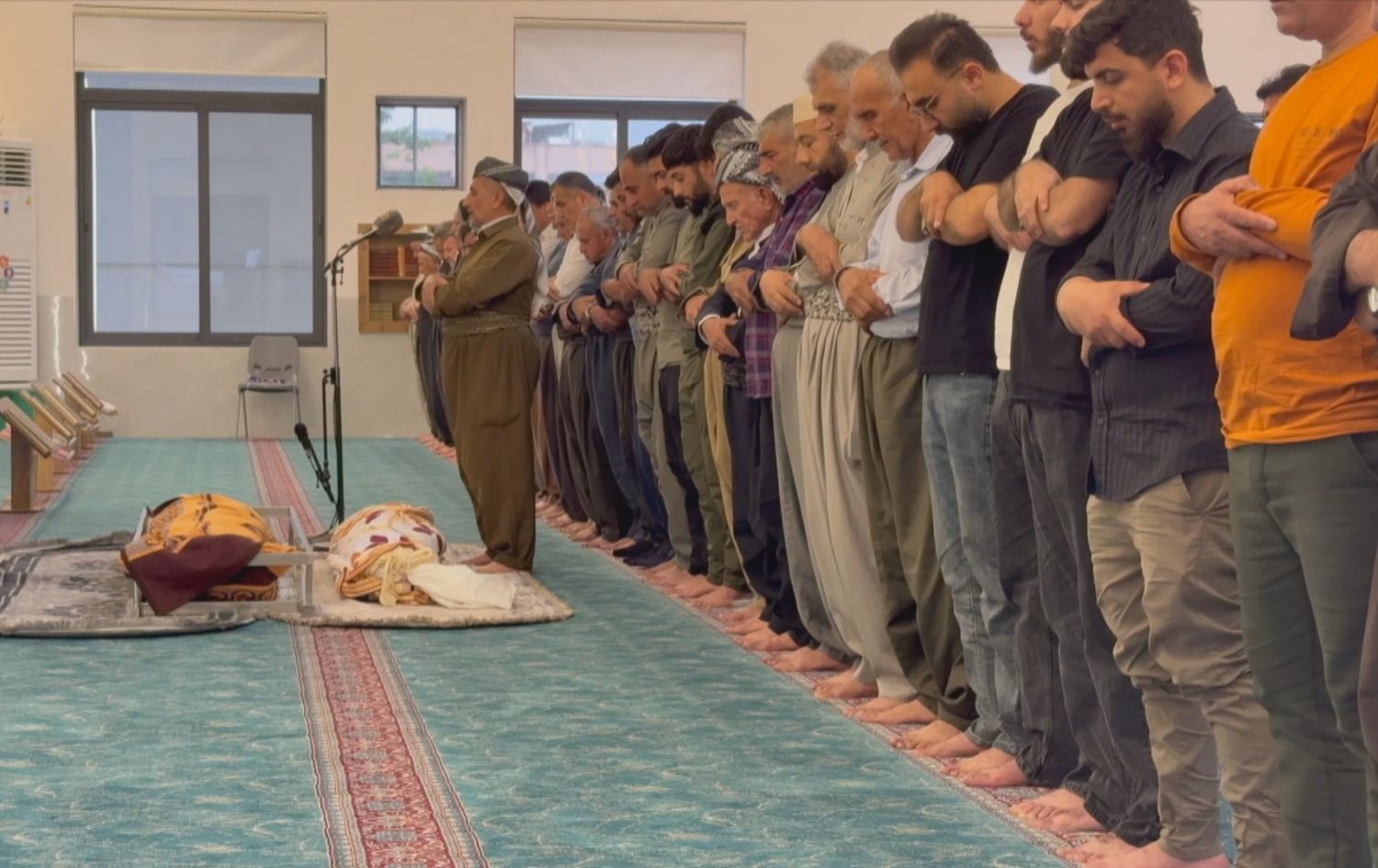 ساتی نوێژکردن لەسەر دووان لە قوربانییەکان