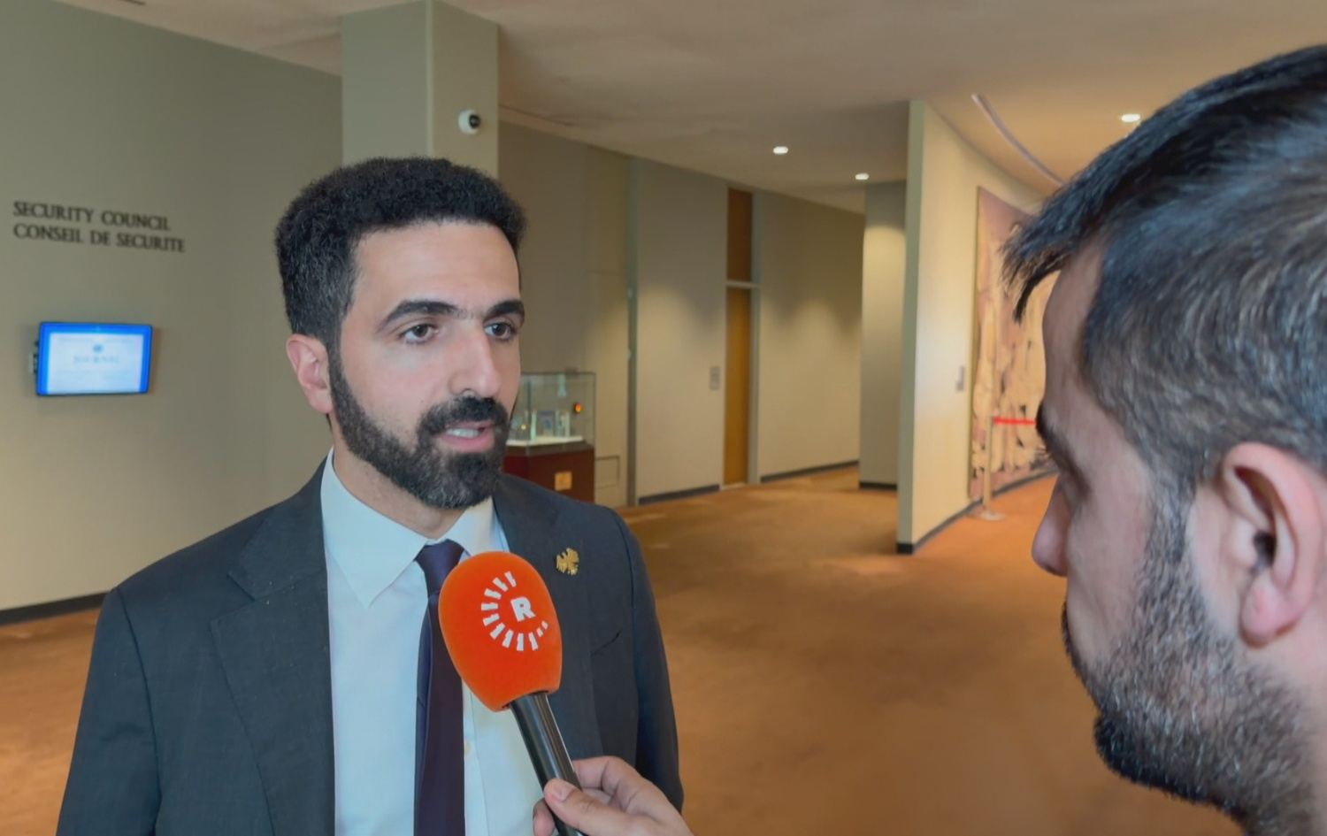 مندوب سوريا لدى الأمم المتحدة إبراهيم علبي متحدثاً الى نامو عبد الله