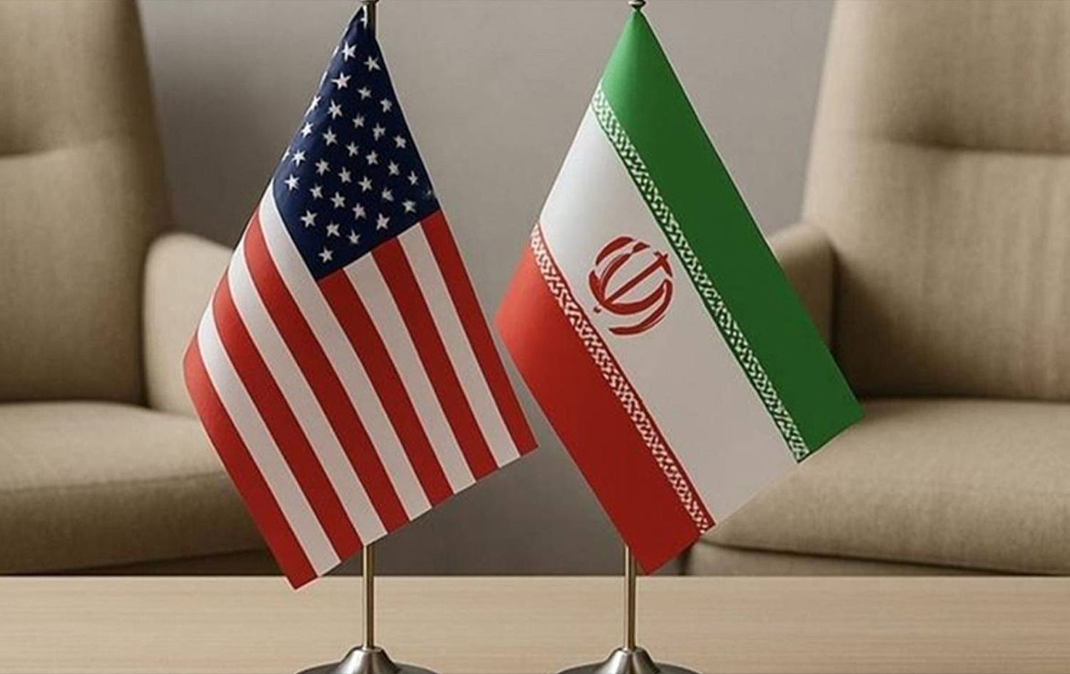 العلمان الأميركي والإيراني